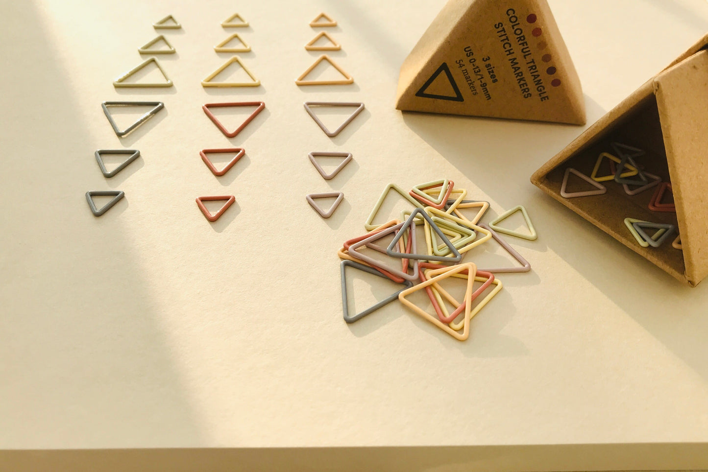 COCOKNITS - Triangular stitch markers in 3 sizes and 6 earth tones